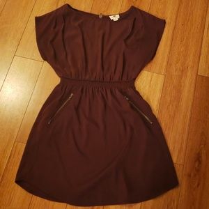 A burgandy mini dress with pockets